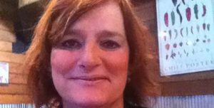 TLC client Tamara Lusardi, who won groundbreaking trans employment discrimination case, smiles