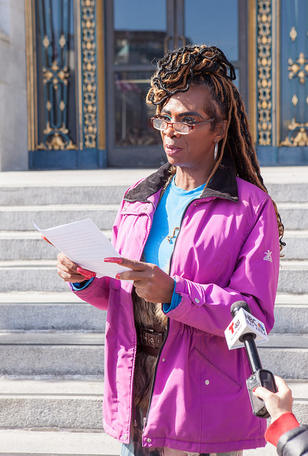 TLC client Tanesh Nutall speaks at rally on the steps of San Francisco City Hall. Photo credit: Pax Ahimsa Gethen