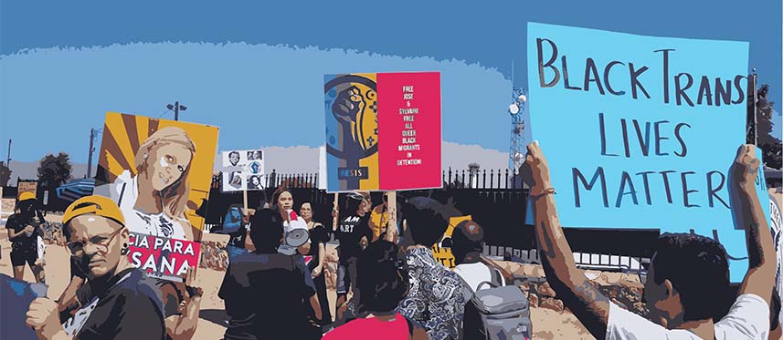 A group of people carrying signs at a protest. The biggest sign reads "Black Trans Lives Matter".