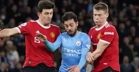 Harry Maguire, Bernardo Silva and Scott McTominay compete for the ball