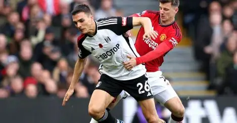 Fulham midfielder Joao Palhinha and Mason Mount battle for the ball.