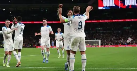 Jude Bellingham and Harry Kane celebrate an England goal.