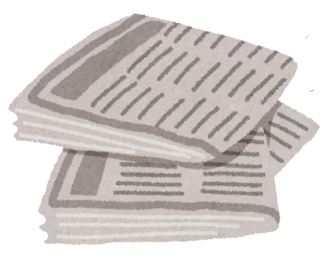 Tres periódicos doblados, uno encima de otro.