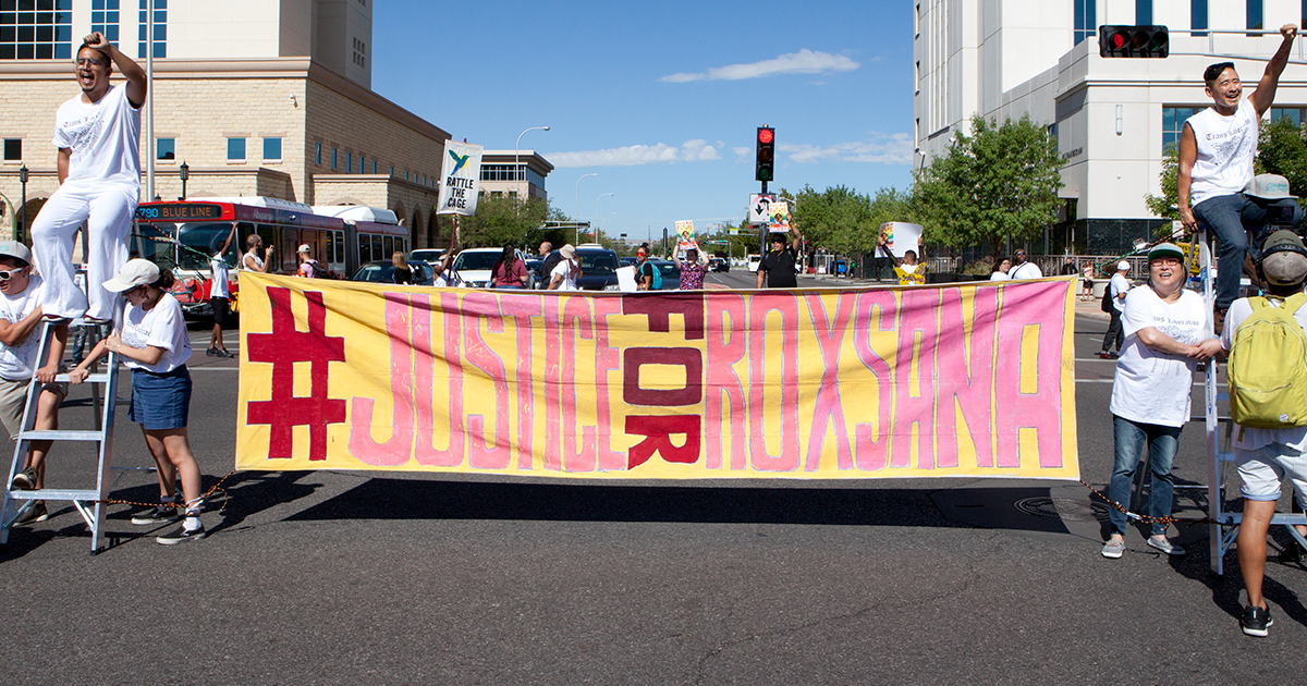 Transgender advocates block traffic intersection in Albuquerque with banner reading Justice For Roxsana